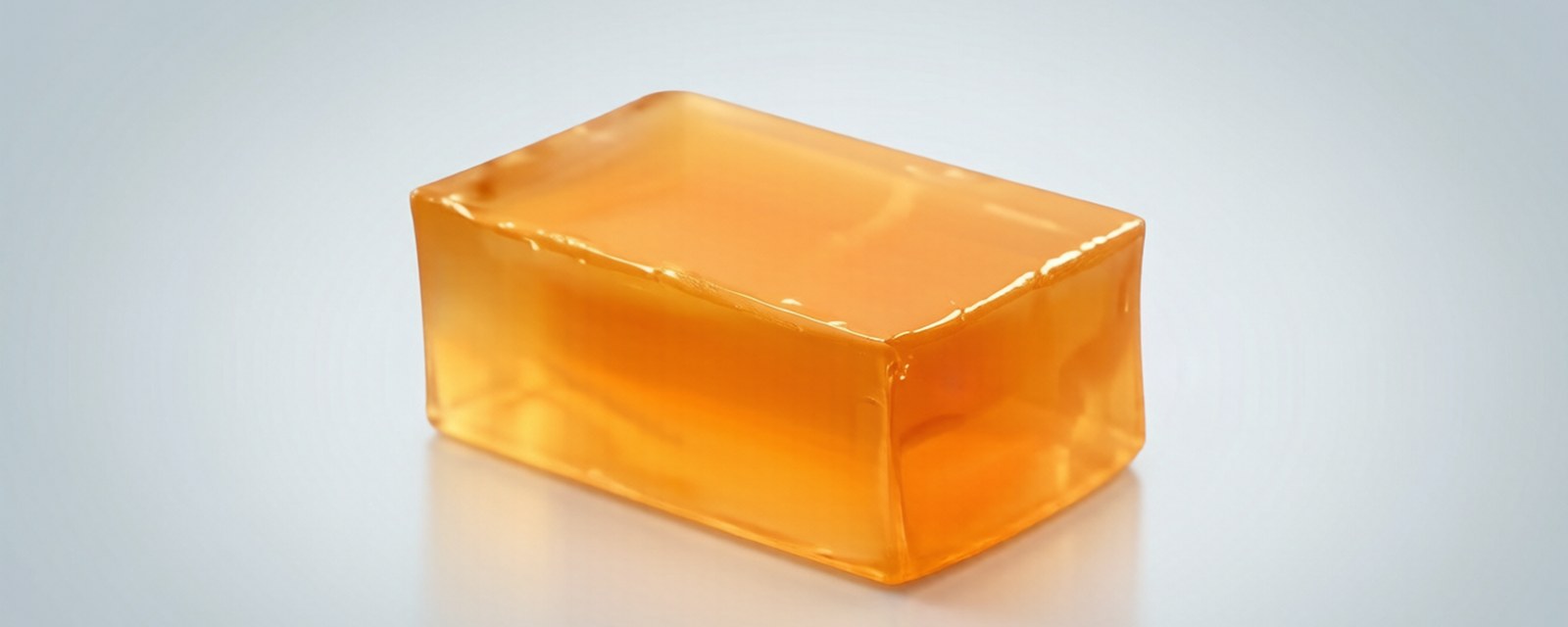 Amber packaging-grade hot melt adhesive block