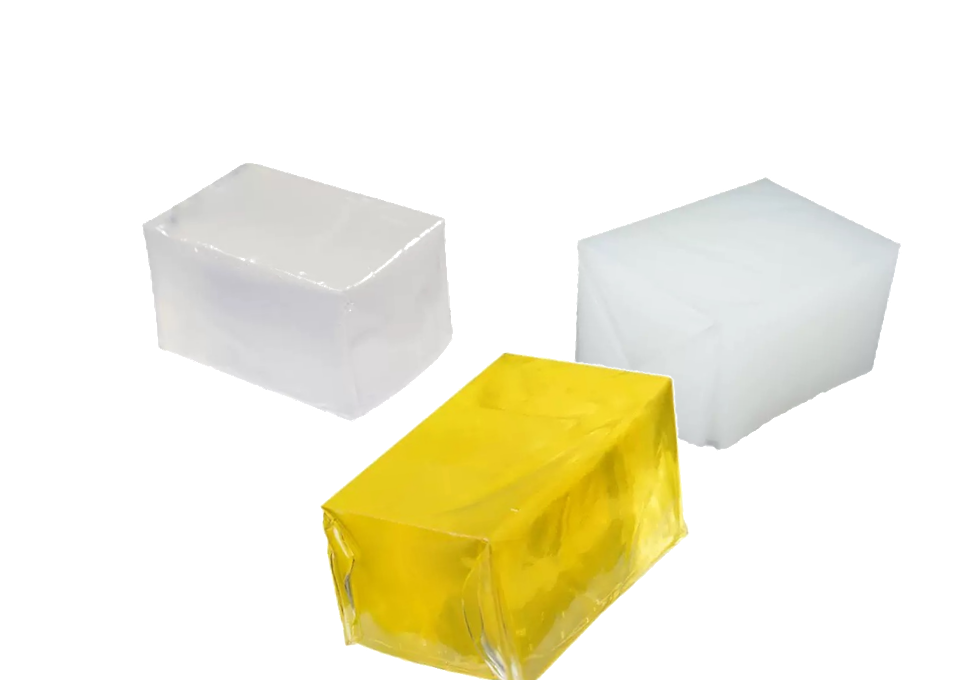 Three hot melt adhesive blocks in a clean studio composition